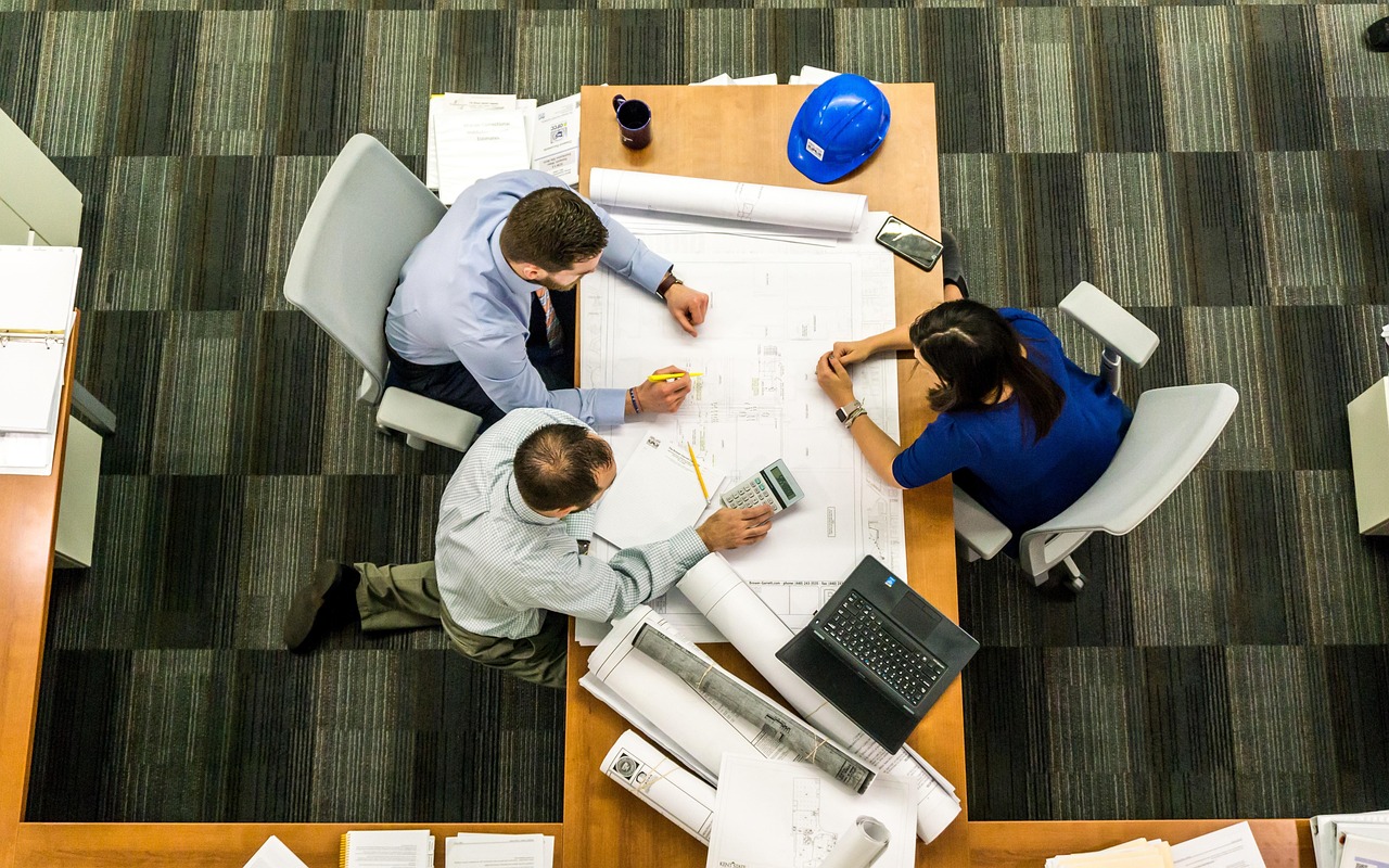 Meeting, business, architect — City Lights to Countryside: Tailoring Renters Insurance for Pennsylvanians